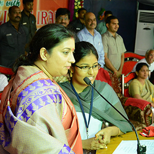 Chief guest addressing participants at a KBN College academic award event